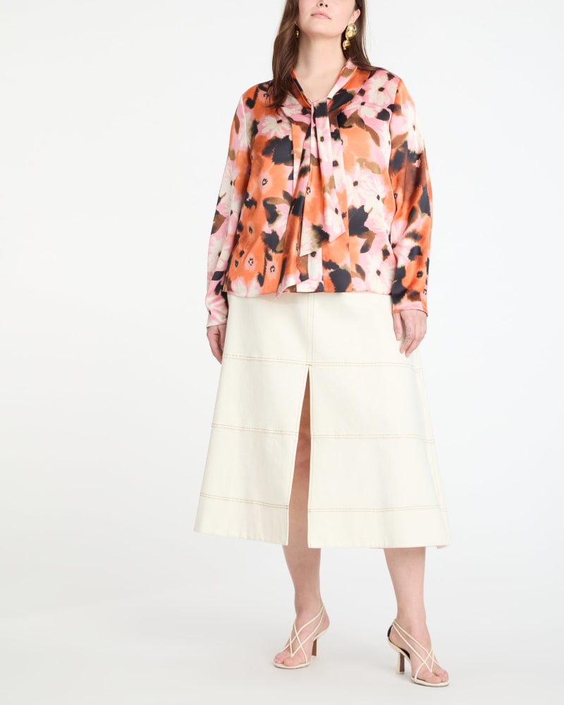 Front of a model wearing a size 3X Canyon Top in Peony Multi by Tanya Taylor. | dia_product_style_image_id:331830